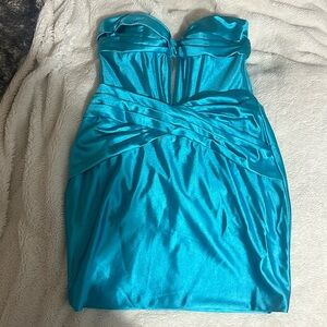 Woman’s satin light blue homecoming dress
